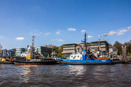 Two tugboats in the harbor of Hamburg, Germanyのeditorial素材
