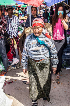 Myanmar tribal woman on the market of Keng Tung in the north of Myanmarのeditorial素材