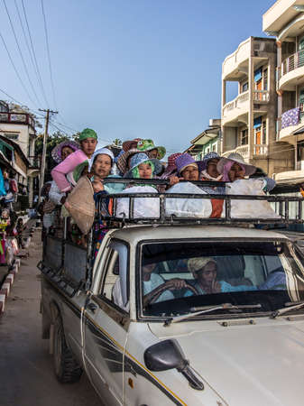 A transport of workers on the load area of a pick up in Keng Tung, Myanmarのeditorial素材