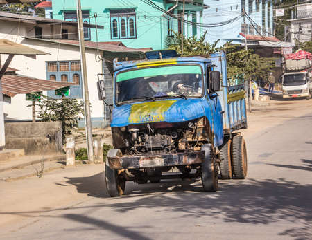 Typical Myanmar streetscene with an old chinese truckのeditorial素材