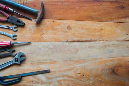 hammer and nails on woodの写真素材