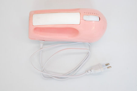 Hand mixer pink isolated on white, Mixer blade or propeller isolated on whiteの写真素材