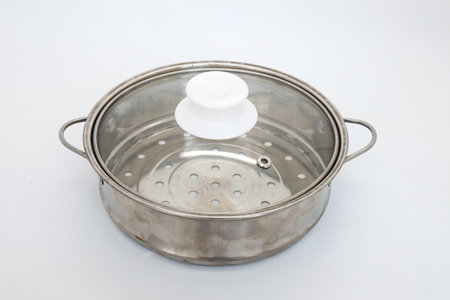 Mini rice cooker, small rice cooking place isolated on whiteの写真素材