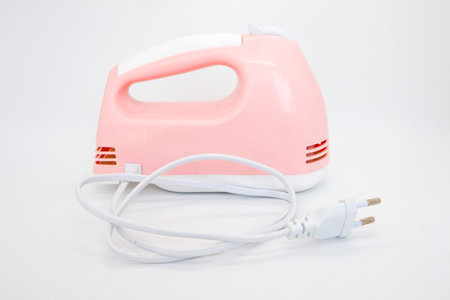 Hand mixer pink isolated on white, Mixer blade or propeller isolated on whiteの写真素材