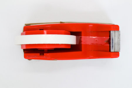 Used insulation cutter that has been isolated brown isolated whiteの写真素材