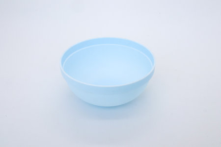 bowl or basin for storing food or vegetables isolated on whiteの写真素材