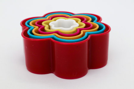 Star, rose and heart shaped cake molds isolated on whiteの写真素材