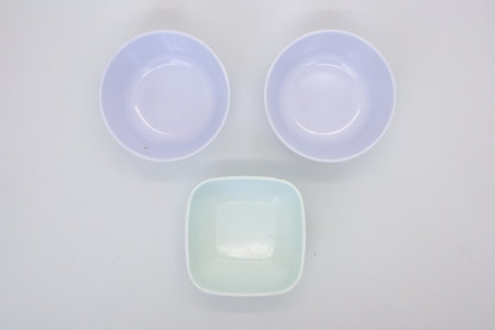 bowl or basin for storing food or vegetables isolated on whiteの写真素材
