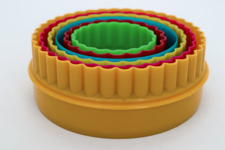 Star, rose and heart shaped cake molds isolated on whiteの写真素材