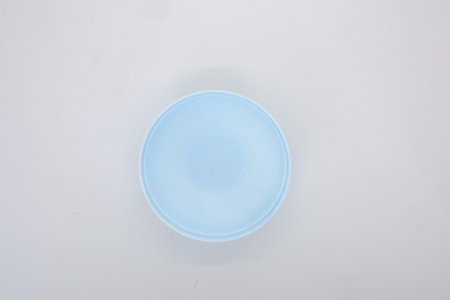 bowl or basin for storing food or vegetables isolated on whiteの写真素材