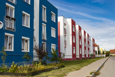colorful houses stand against the blue skyのeditorial素材