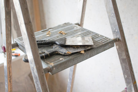 construction tools are on the ladder