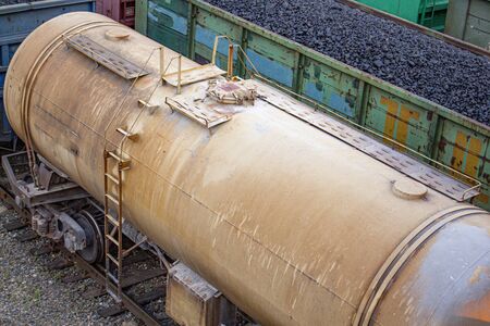railway.wagons loaded with coal standing on the tracksの写真素材