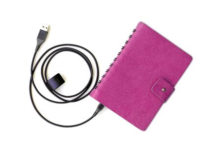 notebook with usb cableの写真素材
