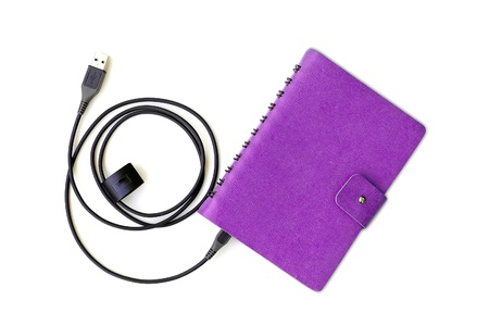 notebook with usb cableの写真素材
