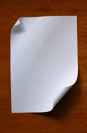 white paper on wood backgroundの写真素材
