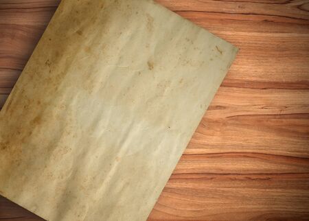 old paper on wooden tableの写真素材