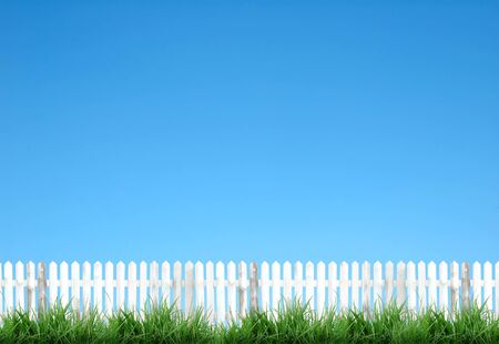 white fence and blue skyの写真素材