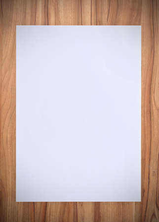 White paper on wood tableの写真素材