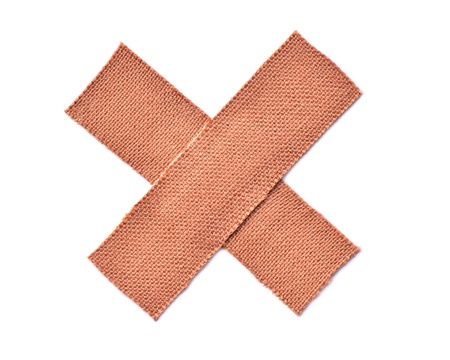 First-aid plaster Isolated on white backgroundの写真素材