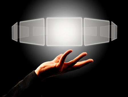 Businessman holding a touch screen buttonの写真素材