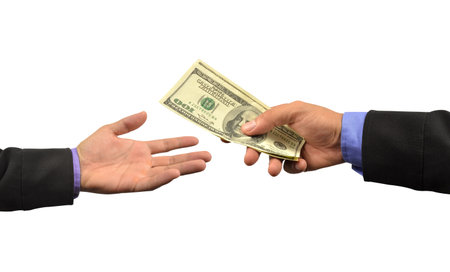 business man holding money in hand 