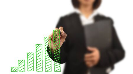 working women write a business graphの写真素材