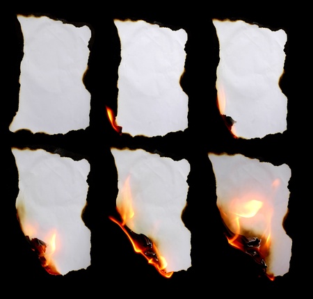 burning paper in dark backgroundの写真素材