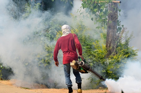 man Fogging to prevent spread of dengue fever in thailandのeditorial素材