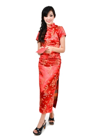 pretty women with cheongsam ,In Chinese new year a red packet is a monetary giftの写真素材