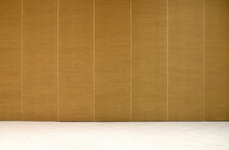 empty brown wall and carpet floorの写真素材