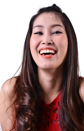 Portrait of a happy woman on a white backgroundの写真素材