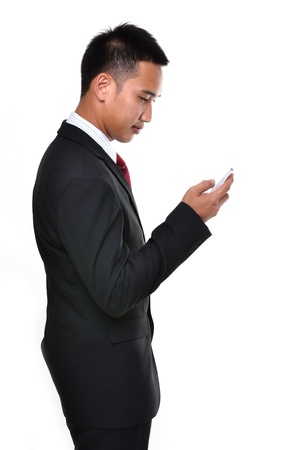 business man use mobile phone isolated on white backgroundの写真素材
