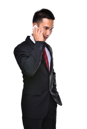 business man use mobile phone isolated on white backgroundの写真素材