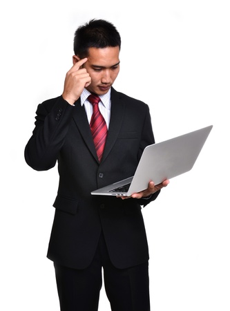 business man with laptop isolated on white backgroundの写真素材
