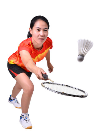 badminton player in action isolated on white backgroundの写真素材