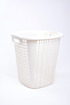white plastic basket isolated on white backgroundの写真素材