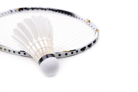 new shuttlecock and racket isolated on  white backgroundの写真素材