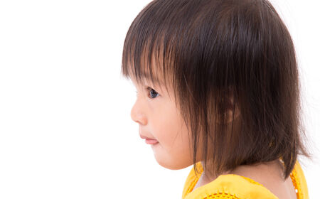 happy childhood concept in the studio isolated on white backgroundの写真素材