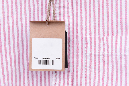price tag with barcode on a shirtの写真素材