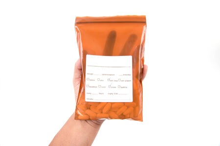 hand hold medicine bag on white backgroundの写真素材