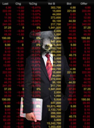 business man with bear head in tock investment conceptの写真素材