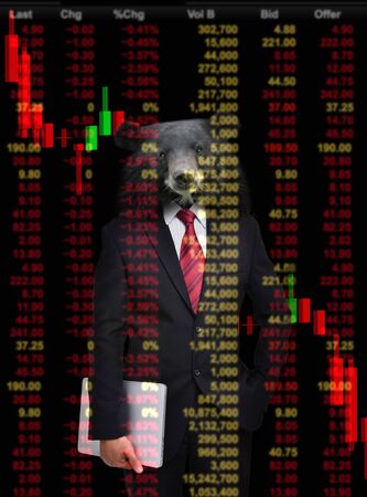 business man with bear head in tock investment conceptの写真素材