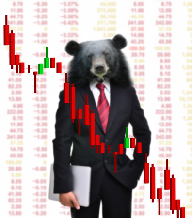 business man with bear head in tock investment conceptの写真素材