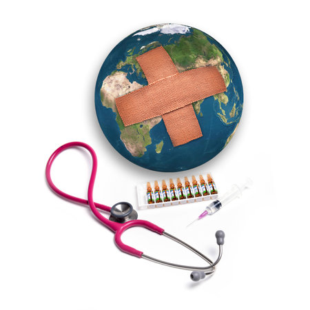 Earth with adhesive plaster with syringe and stethoscope isolated on white backgroundの写真素材