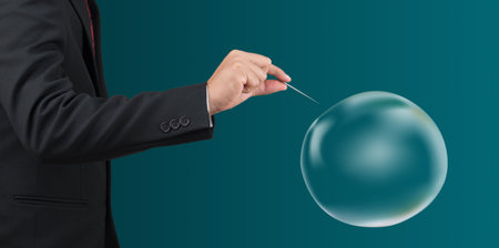 man hold needle stab an empty bubbleの写真素材