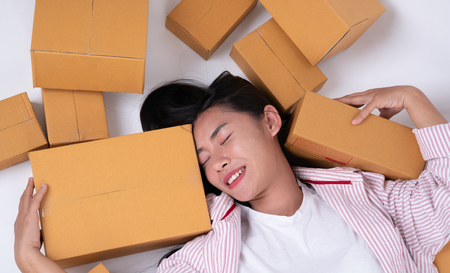 happy woman with many parcel box for delivery to customer or  many box from online shoppingの写真素材