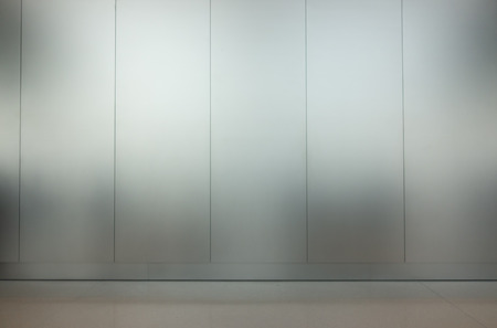 silver steel plate wall backgroundの写真素材