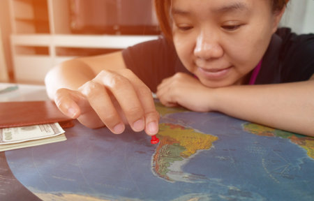 asian woman pinned on the map location