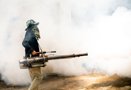 man use fumigation mosquitoes machine for kill mosquito carrier of Zika virus and dengue fever...